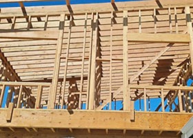 Interior framing showing beams and rafters